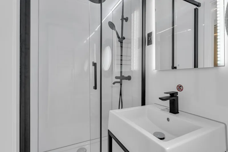 Slide: The Image of Modern bathroom in 2025 Waterlodge Apart EL, featuring sleek shower and minimalist sink design. - 20