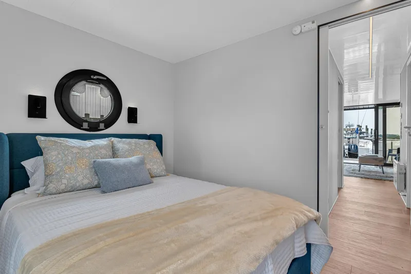 Slide: The Image of Bedroom interior of 2025 Waterlodge Apart EL with modern decor and cozy bedding. - 22