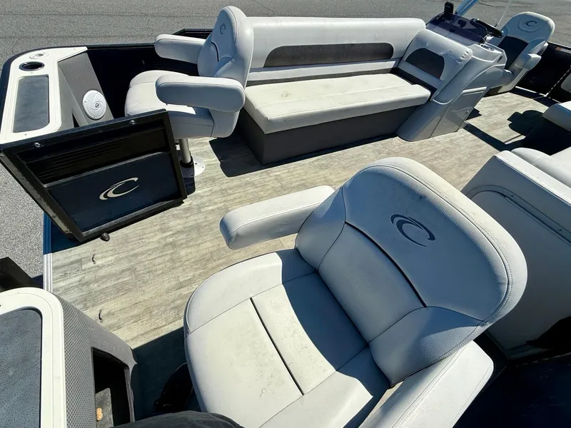Slide: The Image of 2020 Crest Classic LX Fish 220 SF boat interior with comfortable seating and modern design. - 13