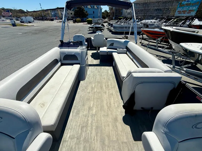 Slide: The Image of 2020 Crest Classic LX Fish 220 SF pontoon boat with spacious seating and modern design. - 14