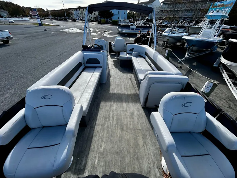 Slide: The Image of 2020 Crest Classic LX Fish 220 SF pontoon boat with spacious seating and modern design. - 9