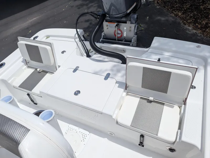 Slide: The Image of 2025 Frontier 2104 boat deck with seating and storage compartments. - 16