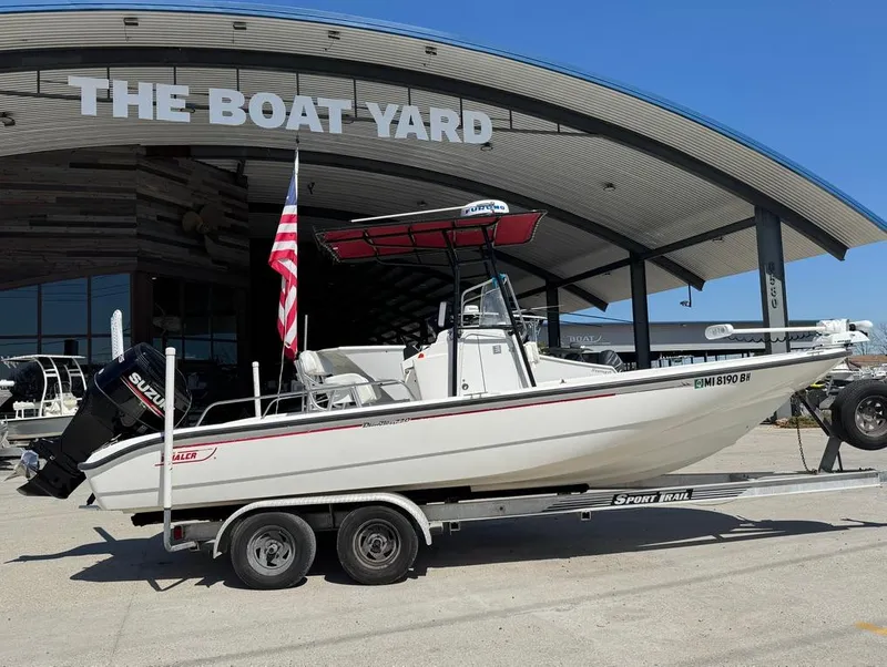 Slide: The Image of 2002 Boston Whaler 220 Dauntless boat on trailer at The Boat Yard. - 6