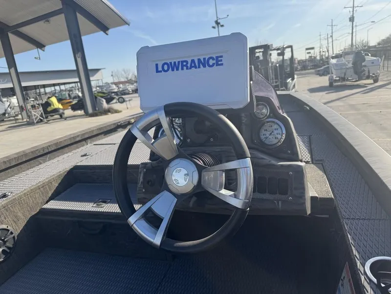 Slide: The Image of 2018 G3 Sportsman 18 Camo boat dashboard with Lowrance navigation system. - 11