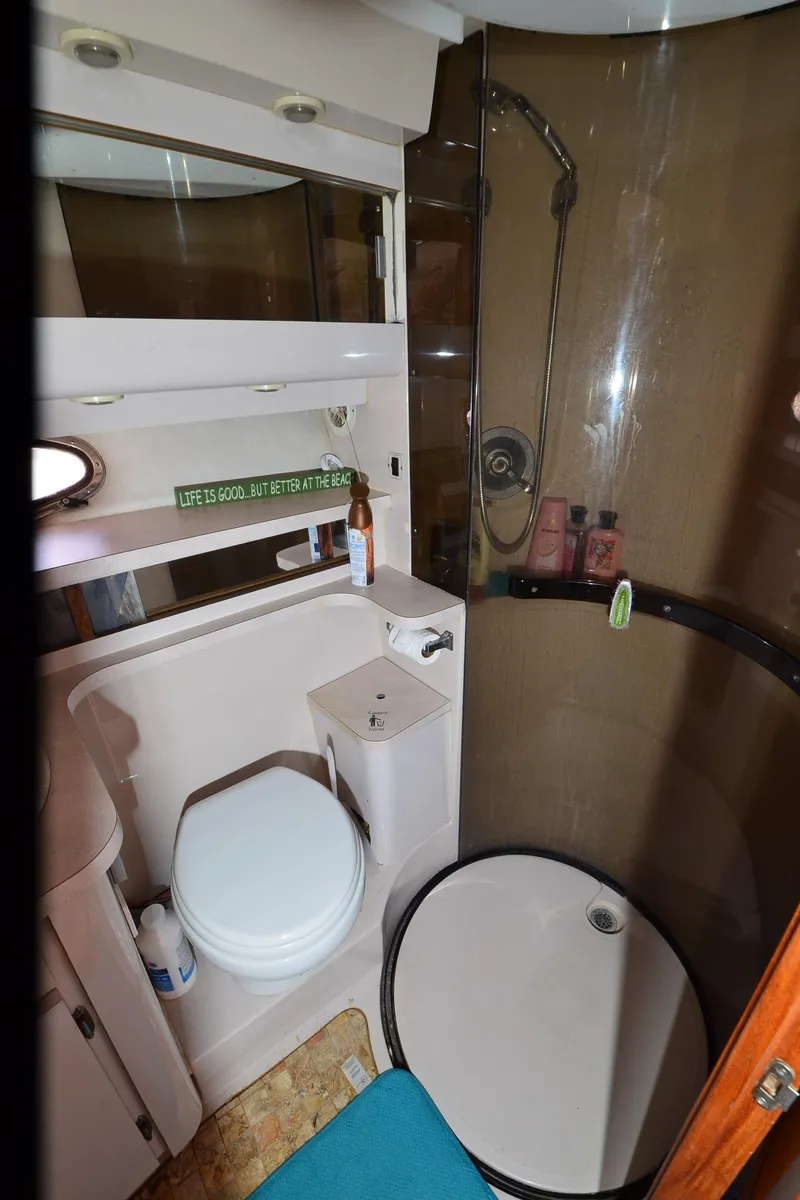 Slide: The Image of Bathroom in 1994 Regal Commodore 400 yacht with shower and toilet. - 34