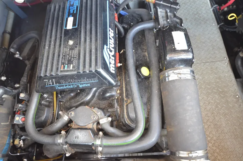 Slide: The Image of 1994 Regal Commodore 400 engine, 7.4L MerCruiser inboard, featuring Thunderbolt IV ignition system. - 36