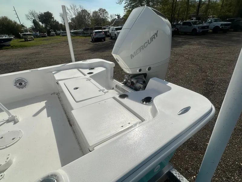 Slide: The Image of 2025 Piranha Casador B2200 boat with open storage compartments on deck. - 10