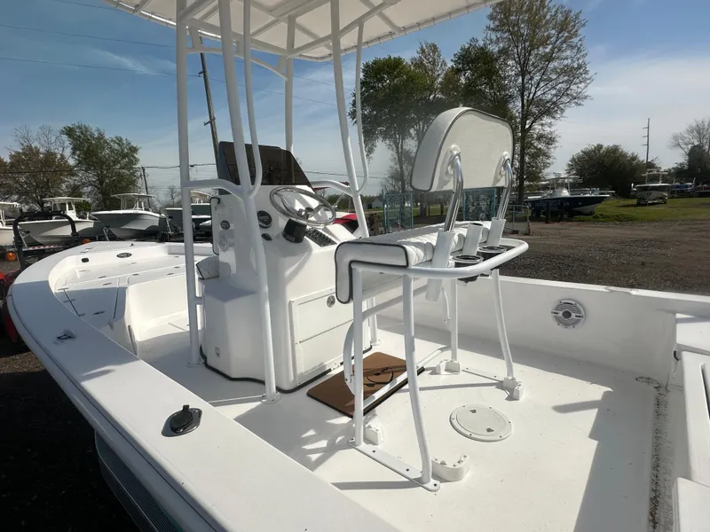 Slide: The Image of Open storage compartment on 2025 Piranha Casador B2200 boat, showcasing interior design. - 11