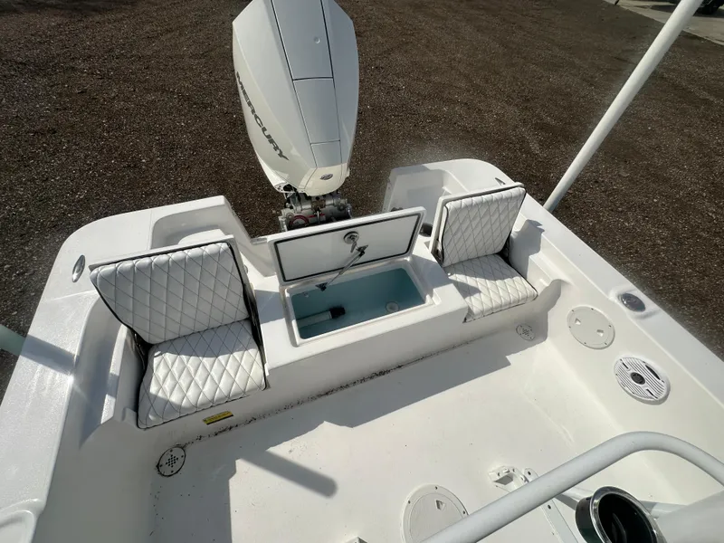 Slide: The Image of Piranha Casador B2200 boat dashboard, 2025 model, featuring steering wheel and control panel. - 19