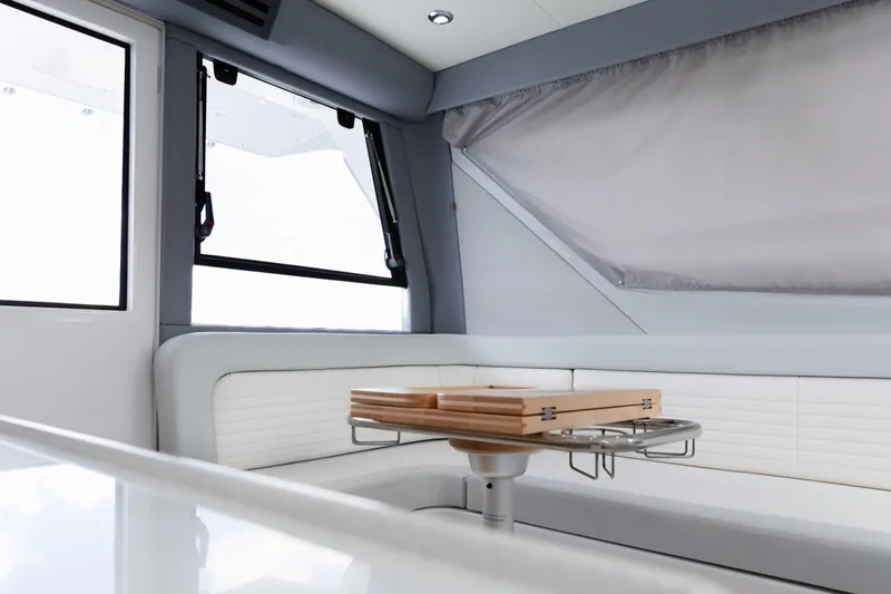 Slide: The Image of Interior of 2020 ArrowCat 320 Fly Dual Helm, featuring sleek seating and modern design. - 12