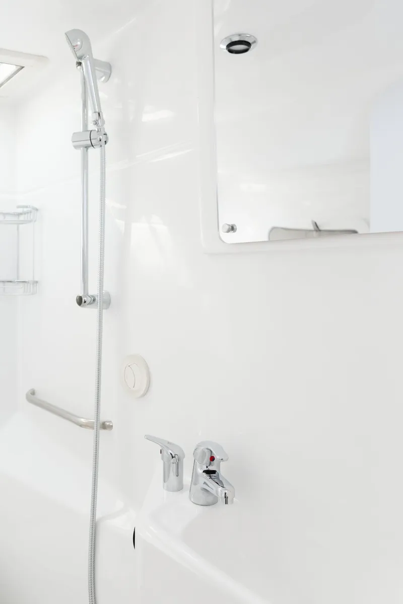 Slide: The Image of Modern bathroom in 2020 ArrowCat 320 Fly Dual Helm yacht, featuring sleek fixtures and shower. - 17