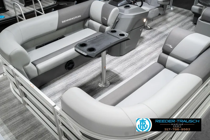 Slide: The Image of 2025 Bennington 21 SLJ pontoon boat interior with gray seating and table. - 12
