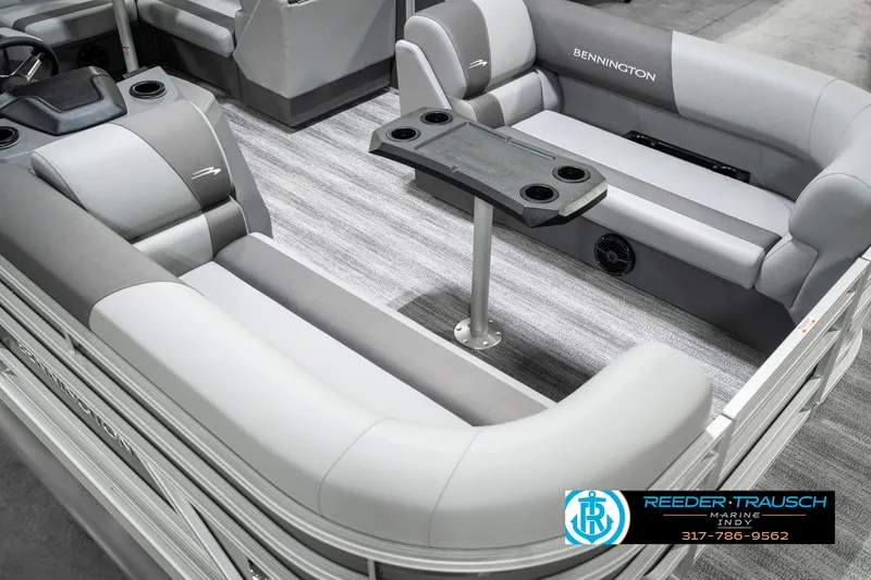 Slide: The Image of 2025 Bennington 21 SLJ pontoon boat interior with gray seating and table. - 13