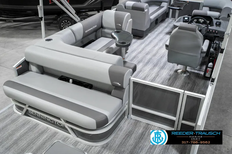 Slide: The Image of 2025 Bennington 21 SLJ pontoon boat interior with gray seating and modern design. - 14
