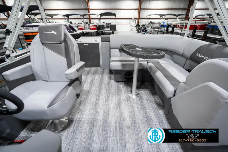 Slide: The Image of 2025 Bennington 21 SLJ pontoon boat interior with gray seating and table. - 17