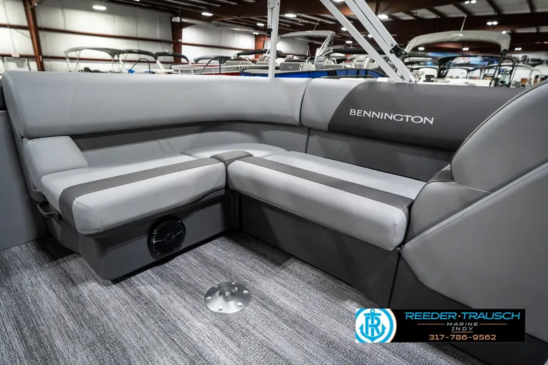 Slide: The Image of Luxurious seating on 2025 Bennington 21 SLJ pontoon boat, featuring sleek gray upholstery. - 27