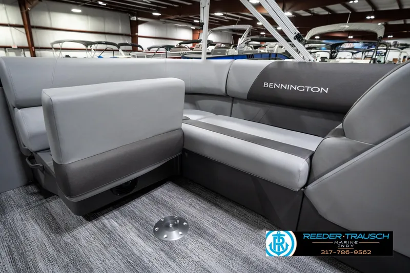 Slide: The Image of 2025 Bennington 21 SLJ boat interior with gray seating and modern design. - 28