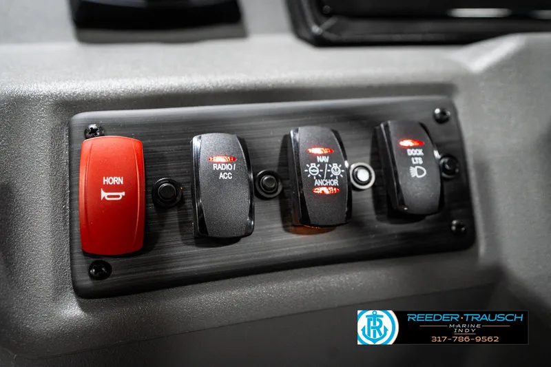 Slide: The Image of Control panel of 2025 Bennington 21 SLJ boat with labeled switches. - 37