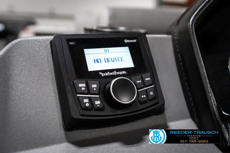 Slide: The Image of Dashboard of 2025 Bennington 21 SLJ with Rockford Fosgate audio system display. - 38