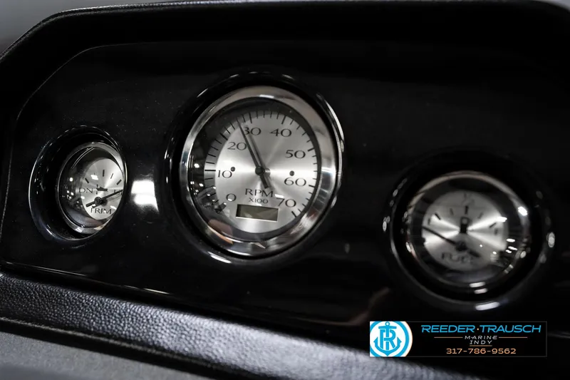Slide: The Image of Dashboard gauges of a 2025 Bennington 21 SLJ boat, featuring speedometer and fuel indicators. - 39