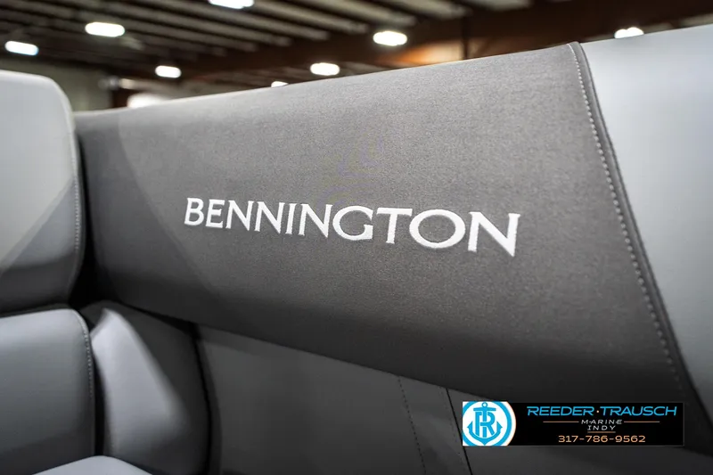 Slide: The Image of 2025 Bennington 21 SLJ boat seat with logo, showcased indoors. - 45