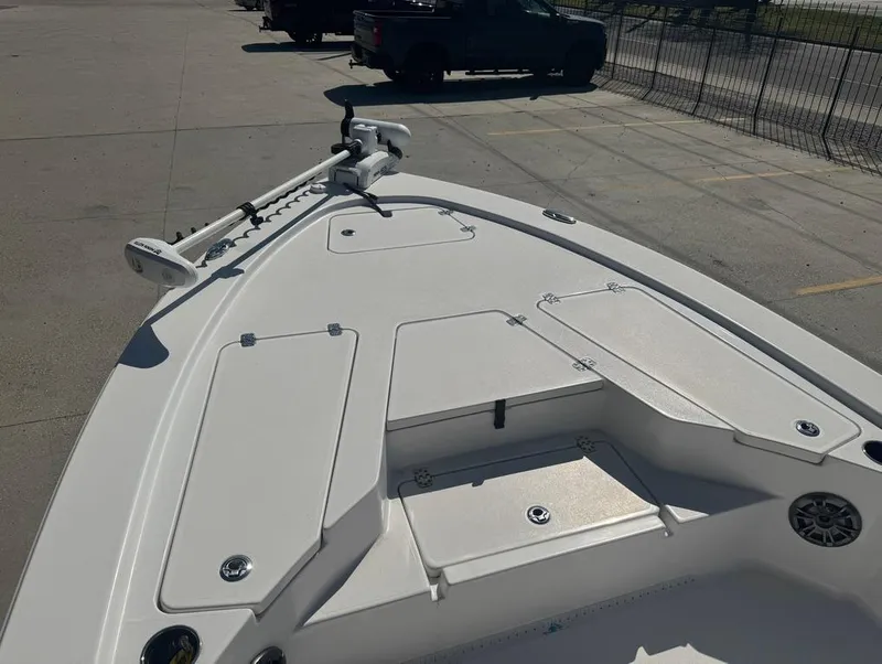 Slide: The Image of 2021 Sportsman Tournament 234 SBX Bay Boat with trolling motor on deck. - 15