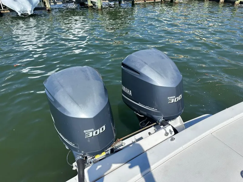 Slide: The Image of Twin Yamaha 300 outboard engines on a 2005 Stamas 320 Express boat. - 12