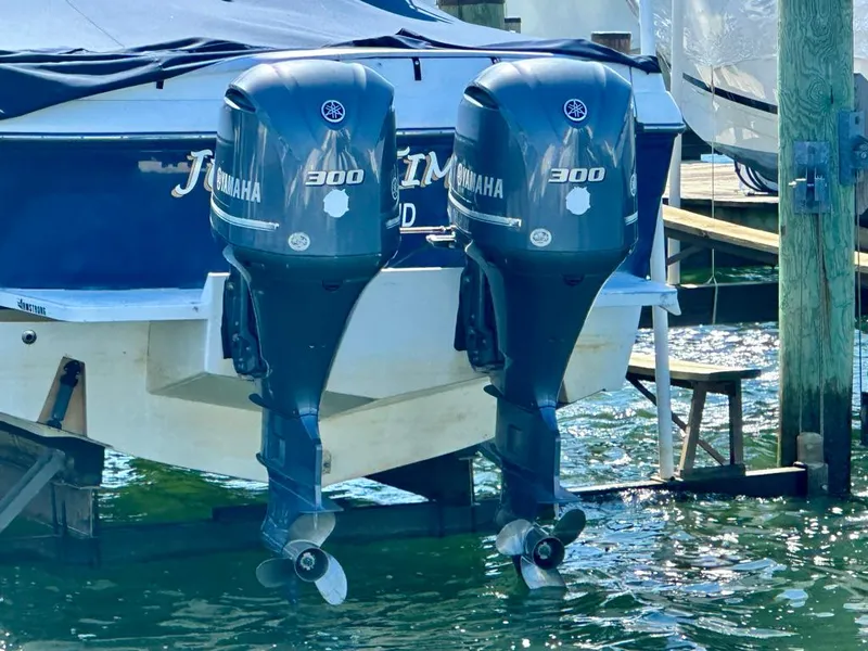 Slide: The Image of Twin Yamaha 300 outboard motors on a 2005 Stamas 320 Express boat. - 14