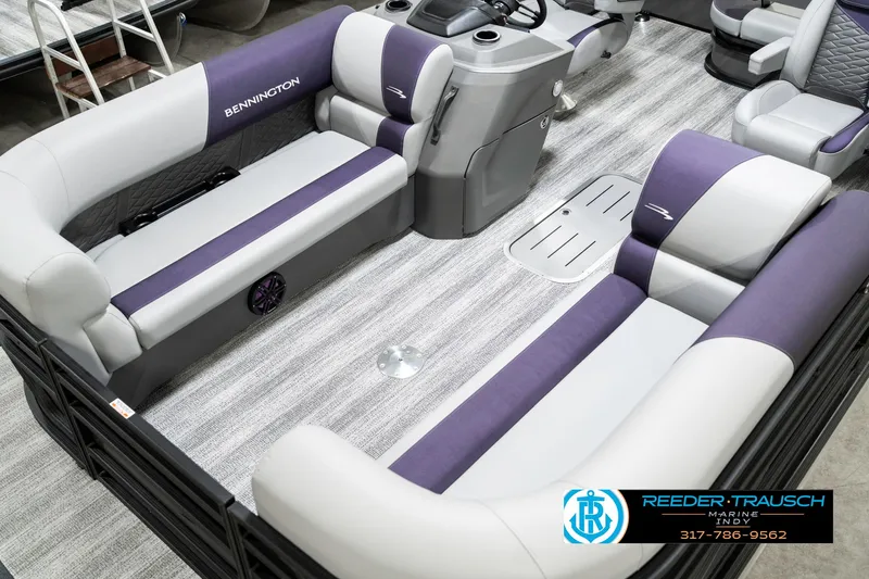 Slide: The Image of 2025 Bennington 21 SSB pontoon boat interior with gray and purple seating. - 12