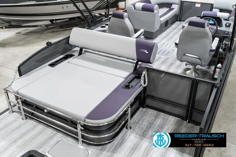 Slide: The Image of 2025 Bennington 21 SSB pontoon boat interior with gray seating and modern design. - 14