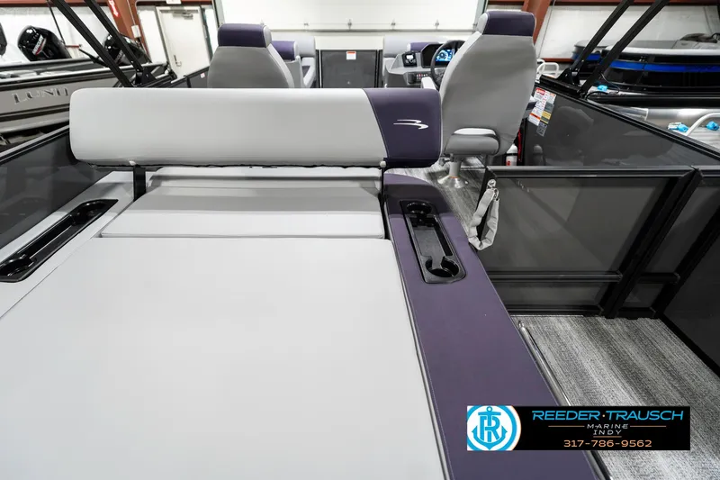 Slide: The Image of 2025 Bennington 21 SSB boat interior with seating and dashboard view. - 19