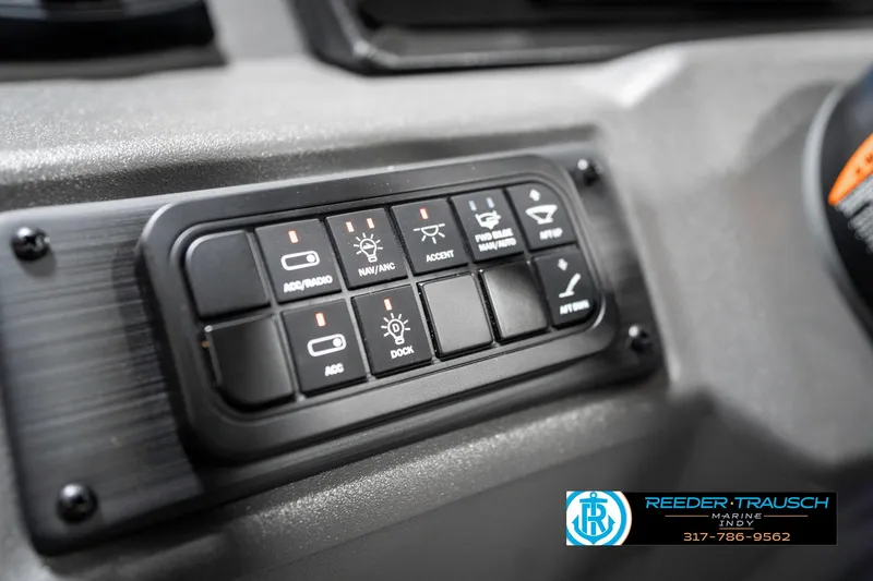 Slide: The Image of Control panel of 2025 Bennington 21 SSB boat with labeled switches. - 35