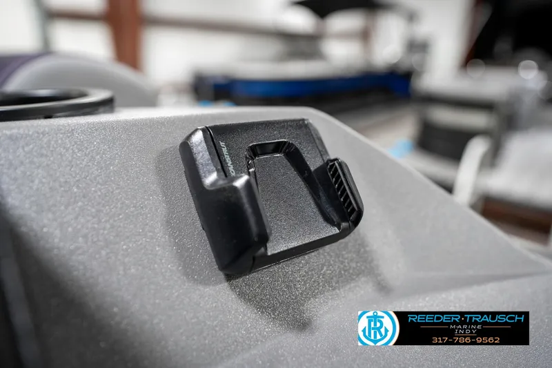 Slide: The Image of Close-up of a 2025 Bennington 21 SSB boat component with Reeder-Trausch branding. - 38