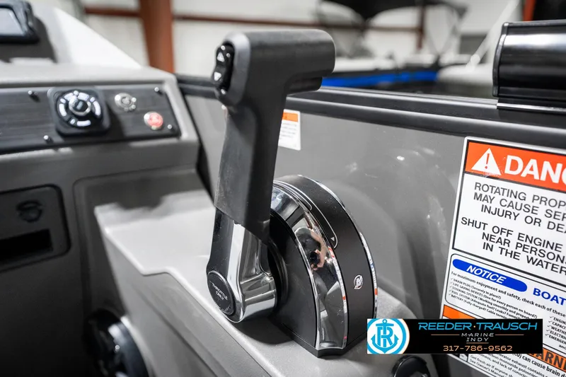 Slide: The Image of Throttle control of 2025 Bennington 21 SSB boat with safety warnings visible. - 40