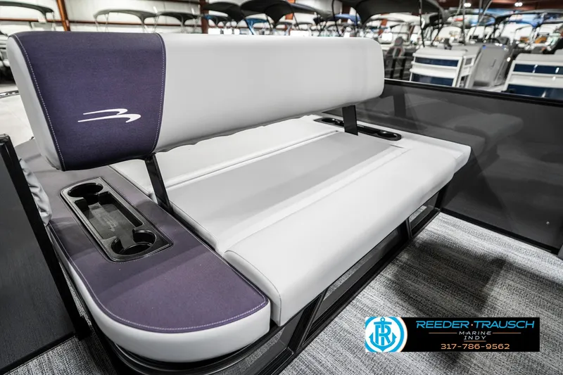 Slide: The Image of 2025 Bennington 21 SSB boat seat with cup holders in showroom. - 43