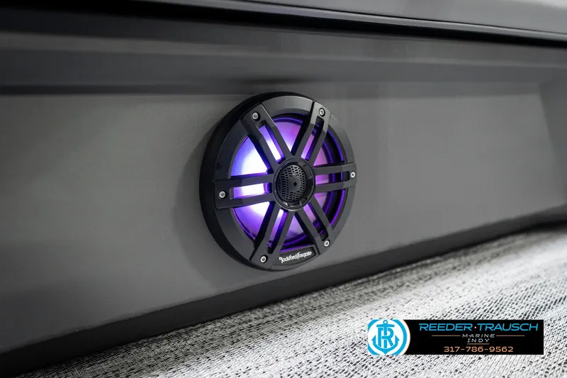 Slide: The Image of 2025 Bennington 21 SSB boat speaker with purple LED lighting. - 48