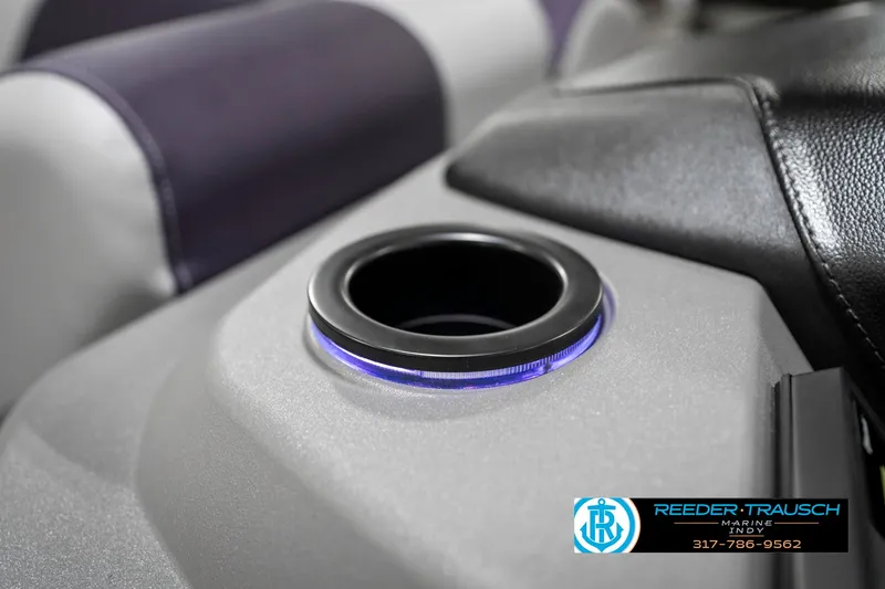Slide: The Image of Cup holder with blue LED light on 2025 Bennington 21 SSB boat interior. - 49