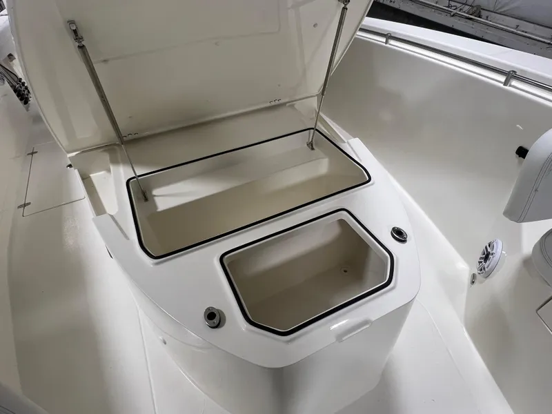 Slide: The Image of 2025 Cobia 350 Center Console boat with open storage compartments. - 20