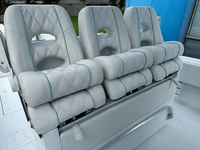 Slide: The Image of 2024 Contender 39 ST boat seats with diamond stitching and armrests. - 10