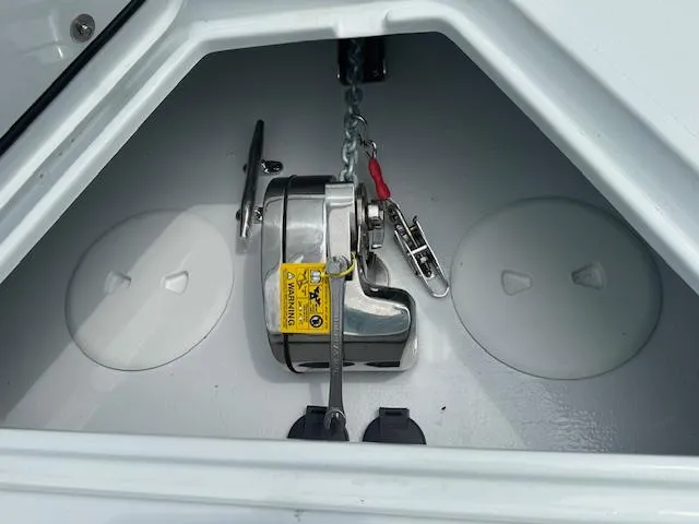 Slide: The Image of Anchor compartment of 2024 Contender 39 ST boat with chain and winch. - 15