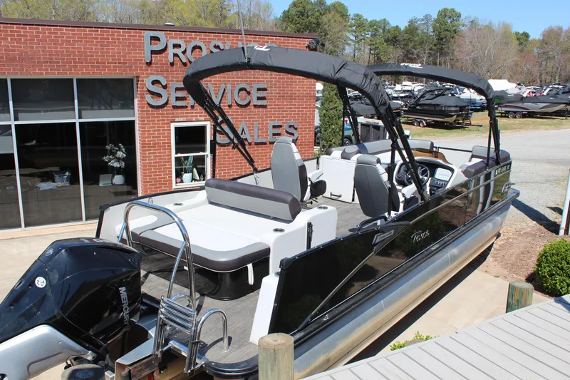 Slide: The Image of 2023 Tahoe Pontoon Cascade Platinum Versatile Rear Bench 25' at dealership. - 4