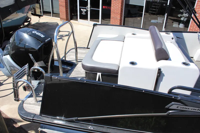 Slide: The Image of 2023 Tahoe Pontoon Cascade Platinum Versatile Rear Bench 25' with Yamaha engine, docked. - 6