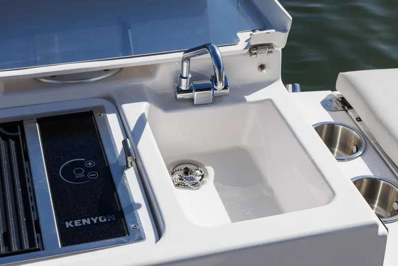 Slide: The Image of Modern sink and grill setup on 2026 Solara 250-C boat. - 25