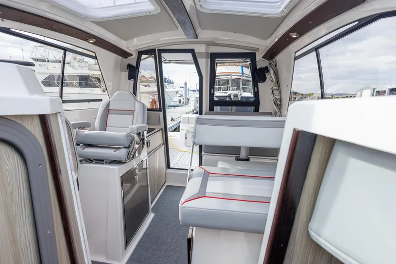 Slide: The Image of Interior of 2026 Solara 250-C boat, featuring modern seating and sleek design. - 8