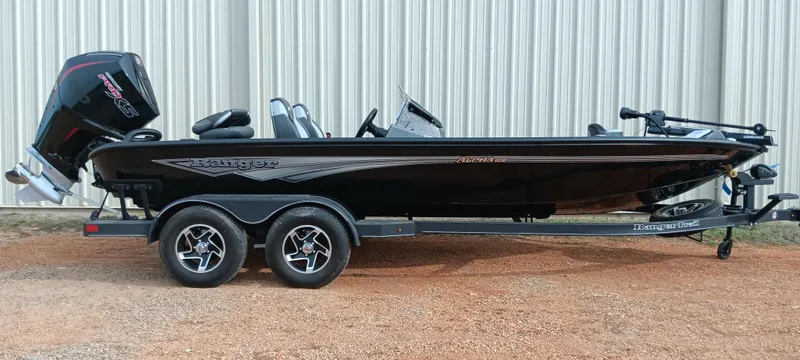 Slide: The Image of 2025 Ranger ALPHA 208 boat on trailer, black exterior, parked outdoors. - 0