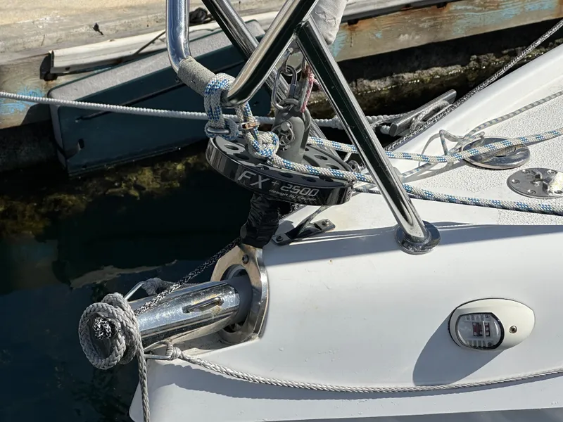 Slide: The Image of Bow of a 2021 Dragonfly 25 Touring sailboat with anchor and rigging. - 13