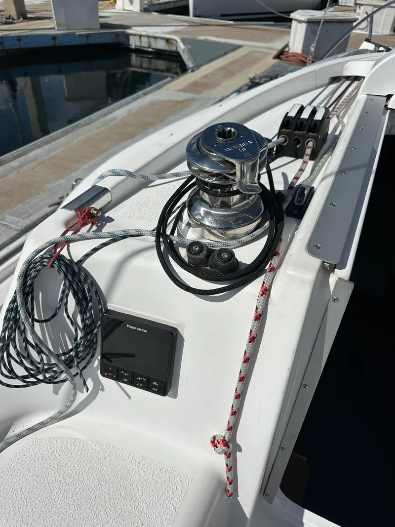 Slide: The Image of Sailing equipment on a 2021 Dragonfly 25 Touring boat, featuring winch and ropes. - 25