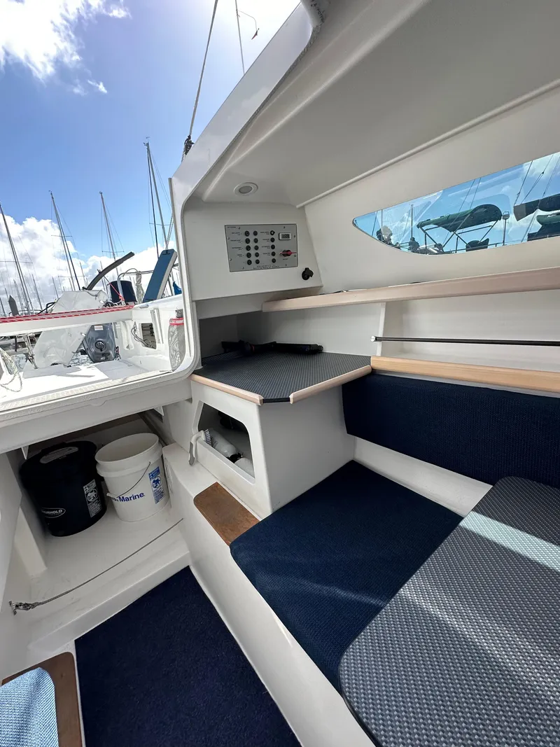Slide: The Image of Interior of 2021 Dragonfly 25 Touring sailboat with seating and storage. - 46