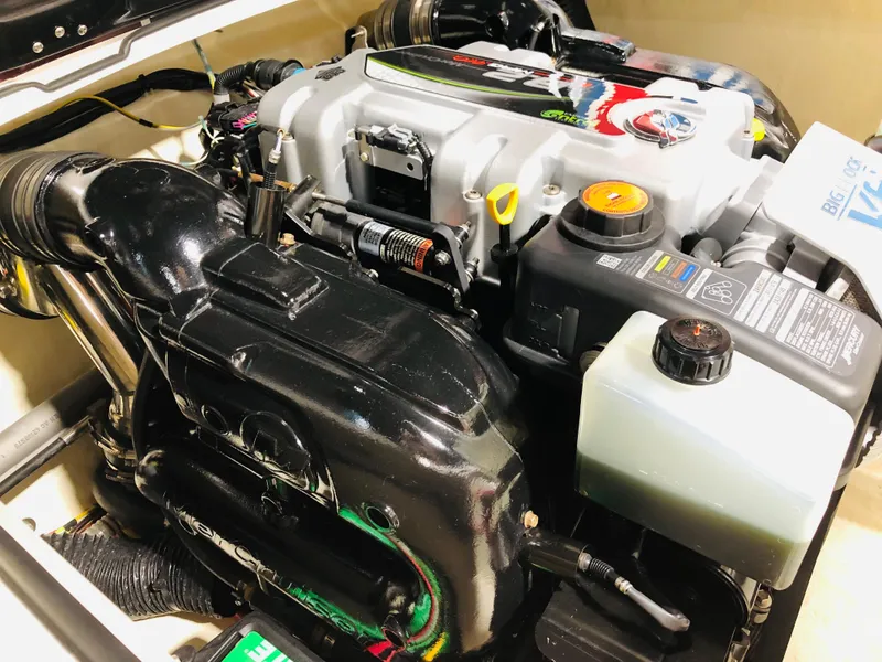 Slide: The Image of Engine of a 2022 Donzi Classic boat, showcasing detailed components and design. - 9