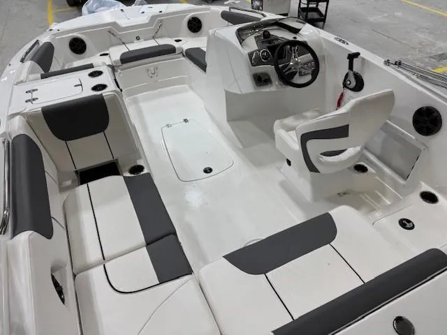 Slide: The Image of 2024 Tahoe 1950 boat interior with sleek seating and modern dashboard design. - 3